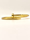 Stylish and modern gold bangle bracelet, perfect for adding a chic touch to any outfit.