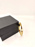 Gold Bracelet with Black Clover Charm