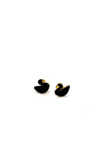 Elegant swan stud earrings featuring black crystals, perfect for a chic look.
