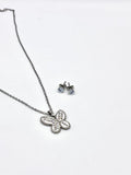 Elegant silver butterfly pendant necklace and crystal stud earrings set for women.