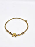 Gold Butterfly Charm Bracelet with Pink Stones
